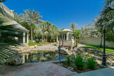 The sprawling landscaped garden. Photo: Engel and Voelkers