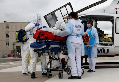 A Covid-19 patient is transferred by helicopter to hospital. Reuters