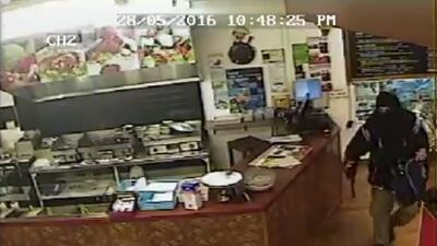 A screen grab of CCTV footage from May 28 showing a failed attempt by a masked man to rob a kebab shop owner in Christchurch, New Zealand. Courtesy Canterbury police video