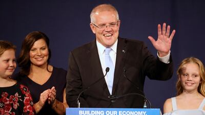 Australian Prime Minister Scott Morrison, nicknamed 'Scomo', with his wife Jenny and daughters Lily, right, and Abbey, far left. Rick Rycroft / AP