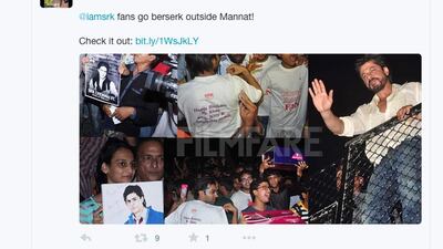 Shah Rukh Khan waves at fans outside his home in Mumbai.