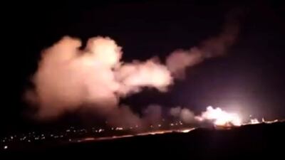 This frame grab from a video provided by the Syrian official news agency SANA shows missiles flying into the sky near Damascus, Syria, Tuesday, Dec. 25, 2018. SANA via AP