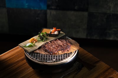 Black Angus rib-eye with sansho pepper sauce and homemade pickles. Photo: Zuma