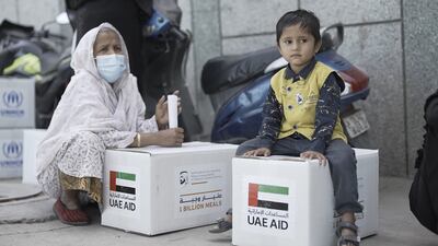 Children in India pictured with free meals.