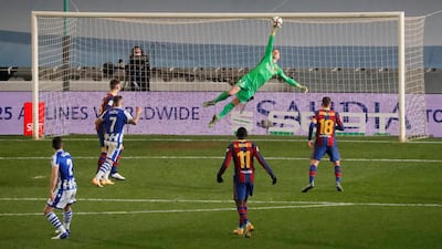 Barcelona goalkeeper Marc-Andre ter Stegen makes a save from Real Sociedad's Joseba Zaldua. Reuters