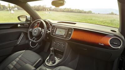 The dash featured 'sunburst' wood in tribute to Fender's instruments, while, as VW put it, 'like the cover of Spinal Tap’s infamous album "Smell The Glove", it is available in just one colour: black'. Volkswagen