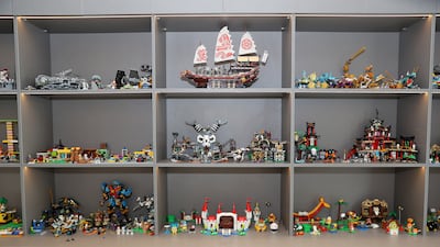There is a display unit for their son's Lego collection