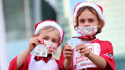Two young runners get in on the seasonal entertainment