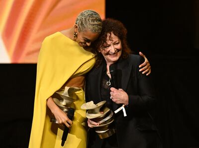 Photographer Nan Goldin accepts her Special Recognition Award at The Fashion Awards 2024, accompanied by cellist Kelsey Lu. Getty Images