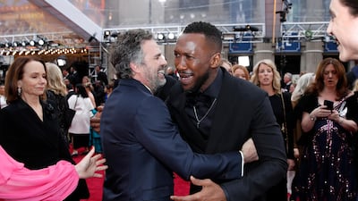 Mark Ruffalo and Mahershala Ali embrace on the red carpet during the Oscars arrivals at the 92nd Academy Awards in Hollywood, Los Angeles, California. Reuters