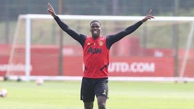 Paul Pogba celebrates in training. Getty