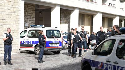Police gather at the site where a car slammed into soldiers on patrol in Levallois-Perret. Stephane De Sakutin.