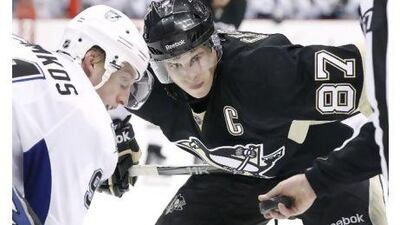 The Penguins' Sidney Crosby, No 87, is injured and his return for the play-offs is doubtful.