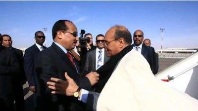 Moncef Marzouki, the Tunisian interim president, right, greets Mauritanian President Mohamed Ould Abdel Aziz last week. Mr Marzouki toured Morocco, Mauritania and Algeria as part of a bid to renew interest in the Arab Maghreb Union.