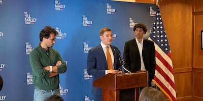 Jacob Helberg, centre, US undersecretary of state for economic affairs, reflected on the importance of working with the UAE on the White House's AI and technology strategy. Cody Combs / The National