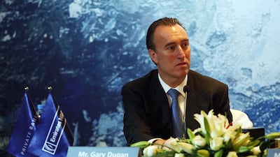 Dubai , United Arab Emirates- January 26, 2011 ; Gary Dugan, Chief Investment Officer, Private Banking, Emirates NBD gestures during the media conference in Dubai . ( Satish Kumar / The National )
