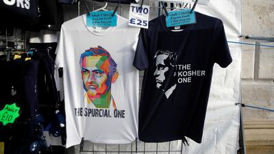 T-shirts of Tottenham Hotspur manager Jose Mourinho for sale at a merchandise kiosk. Reuters