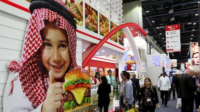 Visitors at the Al Kabeer stand during the Gulfood exhibition in Dubai. Satish Kumar / The National