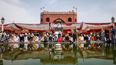 The faithful offer the final Friday prayers of Ramadan at Delhi's Jama Masjid. Reuters