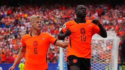 Netherlands' Brian Brobbey celebrates scoring against Tunisia. PA