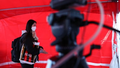 A football fan walks past a thermal camera used to detect signs of the corona virus ahead of the AFC Champions League Group E match between FC Seoul and Melbourne Victory. Getty Images