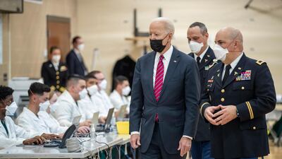 US President Joe Biden tours a Covid-19 vaccination area at Walter Reed National Military Medical Centre in Maryland. EPA