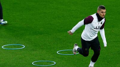 Marco Verratti goes through a warm-up routine during a training session at Camp Nou. EPA