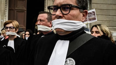 Lawyers protest against a draft bill proposing plea bargaining in criminal cases, in front of the Chambery courthouse, France. AFP