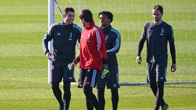 (From L) Juventus' Portuguese forward Cristiano Ronaldo, Italian goalkeeper Mattia Perin, Colombian midfielder Juan Cuadrado and Italian defender Mattia De Sciglio attend a training session. AFP