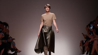 Tennant on the catwalk for the Salvatore Ferragamo spring / summer women's collection 2019, shown in September 2018, Milan. AFP