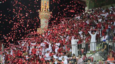 Al Ahli fans showed up early and had plenty to celebrate after their club clinched the Arabian Gulf League on Thursday night with a 2-1 win over Al Wasl in Dubai. Sarah Dea / The National