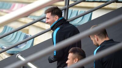 Barcelona’s Argentinian forward Lionel Messi (L), Barcelona’s Brazilian forward Neymar (C) and Barcelona’s defender Gerard Pique (R) arrive for a training session at the Sports Center FC Barcelona Joan Gamper in Sant Joan Despi, near Barcelona on March 14, 2016, on the eve of the Uefa Champions League last sixteen second leg football match between FC Barcelona and Arsenal. AFP / LLUIS GENE