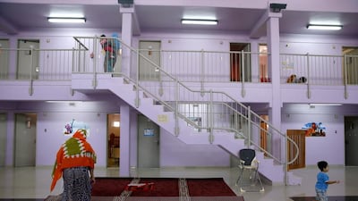 Women and their children spend time together in the main hall inside the women’s prison at Al Mafraq. Silvia Razgova / The National