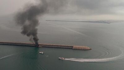 A boat caught fire in The Palm Jebel Ali. Aerial photo taken by Dubai Police Air Wing. Courtesy Dubai Police Department