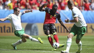 Romelu Lukaku curls home Belgium's first goal of the game during the 3-0 victory of Republic of Ireland. Petr David Josek / AP Photo