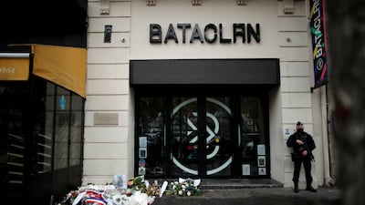 A French policeman stands guard at the Bataclan concert venue during a ceremony marking the fifth anniversary of the deadly terrorist attacks in Paris, on November 13, 2020. Photo: Reuters