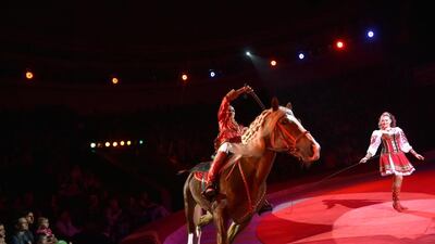 An acrobat performs in a new programme, called ‘Extreme Arena’, by the National Circus of Ukraine in Kiev on September 15, 2016. Sergei Supinsky / Agence France-Presse