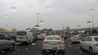 Traffic during the rain on Sheikh Zayed Road in Dubai on March 18. Pawan Singh / The National