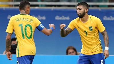Gabriel Barbosa of Brazil celebrates his goal with Neymar during their Rio 2016 Olympics football tournament win over Denmark on Wednesday. Fernando Donasci / Reuters / August 10, 2016