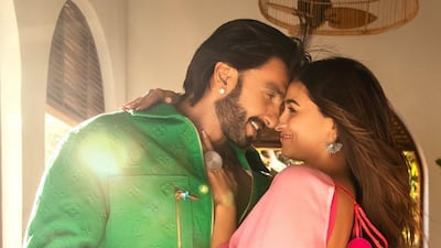 Lime green and 'rani' pink are two prominent colourways in the costumes worn by Ranveer Singh and Alia Bhatt in Rocky Aur Rani Kii Prem Kahani. Photo: Dharma Productions