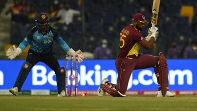 West Indies' captain Kieron Pollard is bowled by Sri Lanka's Wanindu Hasaranga. AFP