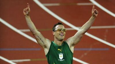 Oscar Pistorius celebrates after winning gold in the men's 400 metres at the Beijing Paralympic Games.
