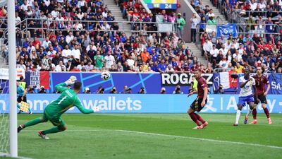 Randal Kolo Muani's deflected shot beats Belgium keeper Koen Casteels. Getty Images