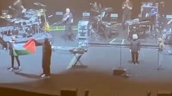 Videos appear to show a Palestinian flag being held up during Massive Attack's concert at The Star Performing Arts Centre in Singapore. Photo: screengrab / Facebook