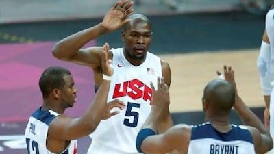 Kobe Bryant, No 10, has had to endure defensive tactics not common during the playing days of the Dream Team, according to our columnist. Jae C Hong / AP Photo