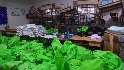 Pakistani election commission workers set up a distribution centre for voting in Karachi, in the lead up to Thursday's national vote. AFP