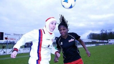 A model, left, demonstrates the sport hijab by Capster. Cindy van den Bremen, the designer has signed a distribution deal with the Sun and Sands Sports chain in the Middle East