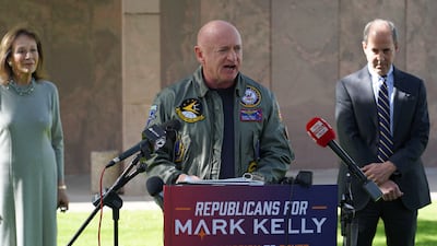 Democratic Senator Mark Kelly speaks at a campaign stop with Republicans who have endorsed him. Willy Lowry / The National