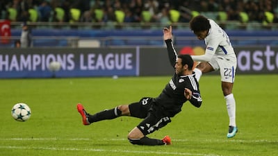 Willian scores Chelsea's fourth goal. Aziz Karimov / Reuters