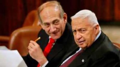 Ariel Sharon, right, and Ehud Olmert attend a session in Israel's parliament in 2005.